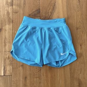 Nike Dri Fit Small blue short/ 2 zipper pockets/ last pic is best shot of color